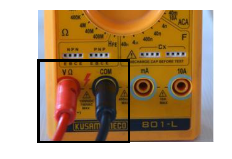 Figure 8. Insert the Test Leads